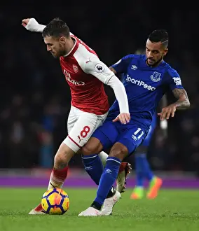 Arsenal V Everton 2017-18 Prints: Clash at the Emirates: Ramsey vs. Walcott Battle for Possession