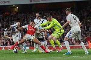 Images Dated 16th May 2017: Clash at Emirates: Sanchez vs Gooch and Pickford in Intense Arsenal v Sunderland Battle