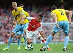 Images Dated 16th August 2014: Clash at Emirates: Sanchez vs. Hangeland and Ward (Arsenal vs. Crystal Palace, 2014/15)