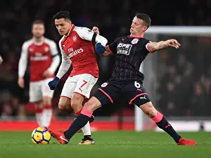 Arsenal V Huddersfield Town 2017-18 Prints: Clash at Emirates: Sanchez vs. Hogg in Arsenal's Battle Against Huddersfield