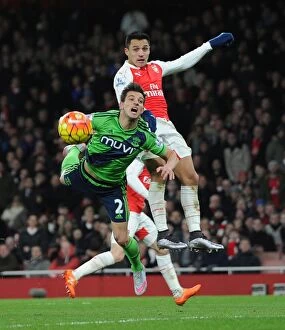Arsenal v Southampton 2015-16 Collection: Clash at Emirates: Sanchez vs. Soares - A Head-to-Head Battle
