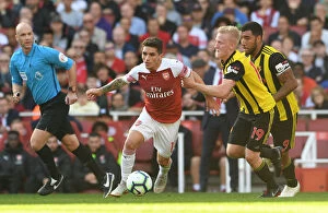 Images Dated 29th September 2018: Clash at Emirates: Torreira Tackles Hughes and Deeney (Arsenal vs. Watford, 2018-19)