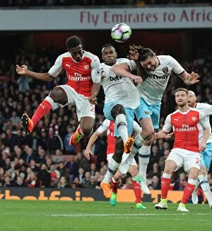 Images Dated 5th April 2017: Clash at the Emirates: Welbeck vs. Antonio & Carroll, Arsenal vs. West Ham United, Premier League