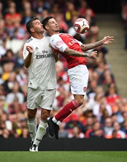 Arsenal Legends v Real Madrid Legends 2018-19 Collection: Clash of Football Legends: Aliadiere vs Pavon - Arsenal vs Real Madrid