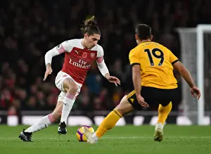 Arsenal V Wolverhampton Wanderers 2018-19 Prints: Clash of Forces: Bellerin vs. Castro in Intense Arsenal vs. Wolves Showdown