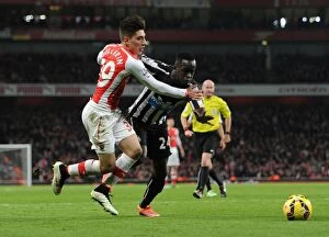 Images Dated 13th December 2014: Clash of Forces: Bellerin vs. Tiote - Arsenal vs. Newcastle United, Premier League, 2014