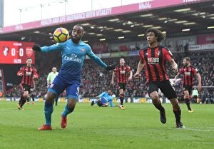 Images Dated 14th January 2018: Clash of Forces: Lacazette vs Ake in AFC Bournemouth vs Arsenal Premier League Showdown