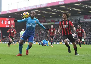 AFC Bournemouth V Arsenal 2017-18 Prints: Clash of Forces: Lacazette vs Ake in AFC Bournemouth vs Arsenal Premier League Showdown