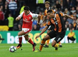 Hull City v Arsenal 2016-17 Collection: Clash of Forces: Sanchez vs. Davies - Arsenal's Star Forward vs