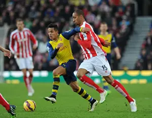 Clash of Forces: Sanchez vs Nzonzi - Arsenal's Intense Battle at Britannia Stadium