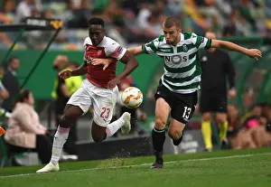 Sporting Lisbon V Arsenal 2018-19 Prints: Clash of the Forwards: Welbeck vs Petrovic in UEFA Europa League Showdown