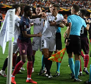 Valencia CF V Arsenal 2018-19 Prints: Clash of Giants: Ainsley Maitland-Niles vs