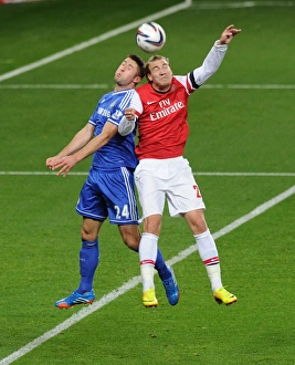 Arsenal V Chelsea - Capital One Cup 4th Rd 2013-14 Prints: Clash of Giants: Bendtner vs. Cahill - Arsenal vs. Chelsea, Capital One Cup 2013-14