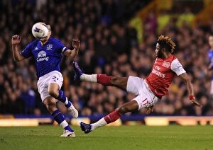 Everton v Arsenal 2011-12 Collection: Clash at Goodison Park: Alex Song vs. Leon Osman