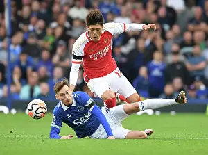 Everton V Arsenal 2023-24 Prints: Clash at Goodison Park: Arsenal's Tomiyasu Faces Off Against Everton's Garner (2023-24)