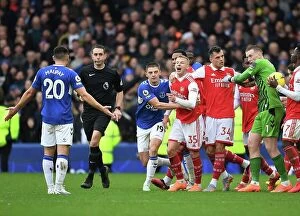 Everton v Arsenal 2022-23 Collection: Clash at Goodison Park: Arsenal's Zinchenko Faces Off Against Everton's Maupay in Premier League