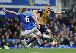Everton V Arsenal 2015-16 Prints: Clash at Goodison Park: A Head-to-Head Battle Between Calum Chambers and Phil Jagielka