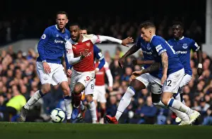 Clash at Goodison Park: Lacazette Faces Off Against Sigurdsson and Digne