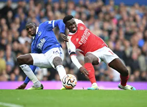 Clash at Goodison Park: Nketiah vs. Doucoure - Everton vs. Arsenal, Premier League 2023-24