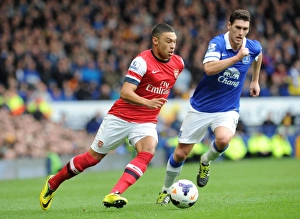 Everton Prints: Clash at Goodison Park: Oxlade-Chamberlain vs. Barry - A Football Rivalry