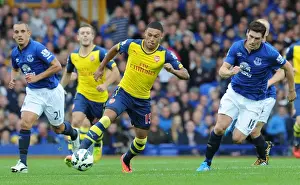 Everton V Arsenal 2014/15 Prints: Clash at Goodison Park: Oxlade-Chamberlain vs Osman & Barry