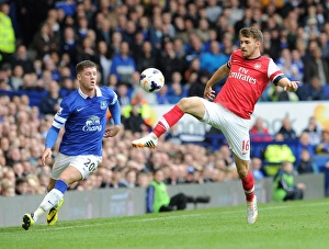 Everton Prints: Clash at Goodison Park: Ramsey vs. Barkley in Premier League Showdown