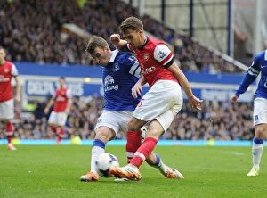 Everton v Arsenal 2013/14 Collection: Clash at Goodison Park: Ramsey vs. Coleman in Premier League Showdown