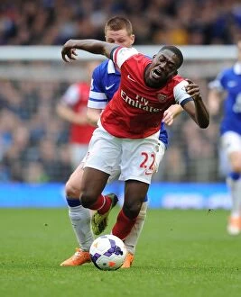 Everton v Arsenal 2013/14 Collection: Clash at Goodison Park: Yaya Sanogo vs. James McCarthy