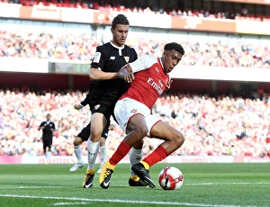Arsenal V Seville - Emirates Cup 2017-18 Prints: Clash between Iwobi and Corchia: Arsenal vs. Sevilla at Emirates Cup 2017-18