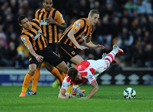 Hull City V Arsenal 2014/15 Prints: Clash at KC Stadium: Olivier Giroud vs. Hull City's Jake Livermore and Michael Dawson