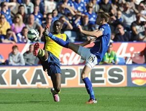 Images Dated 31st August 2014: Clash at The King Power: Sanogo vs. King - Leicester City vs. Arsenal (2014-15)