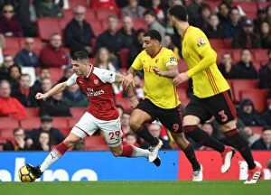 Images Dated 11th March 2018: Clash of Leaders: Xhaka vs. Deeney - Arsenal vs. Watford, Premier League