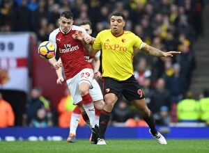 Images Dated 11th March 2018: Clash of Leaders: Xhaka vs. Deeney - Arsenal vs. Watford, Premier League