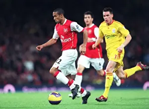 Arsenal V Liverpool 2006-07 Prints: Clash of the Left Backs: Arsenal's Gael Clichy Shines in 3:0 Victory over Liverpool's Steve Finnan