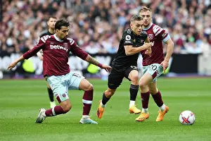 Clash at London Stadium: Arsenal's Trossard Faces Off Against West Ham's Paqueta and Bowen