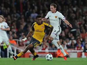 Arsenal V FC Basel 2016-17 Prints: Clash of the Midfield: Alex Iwobi vs