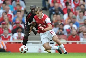 Images Dated 31st July 2010: Clash of Midfield Maestros: Jack Wilshere (Arsenal) vs. Clarence Seedorf (AC Milan)