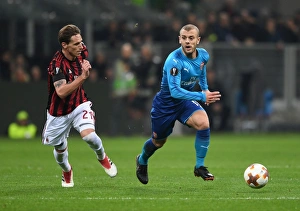 AC Milan V Arsenal 2017-18 Prints: Clash of Midfield Maestros: Jack Wilshere vs
