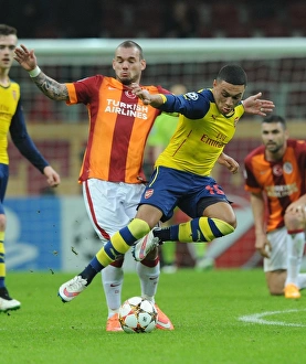 Galatasaray V Arsenal 2014/15 Prints: Clash of Midfield Maestros: Oxlade-Chamberlain vs