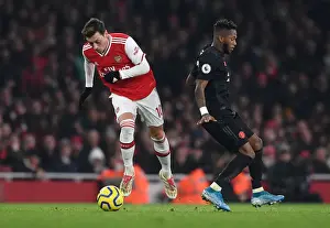 Clash of the Midfield Maestros: Ozil vs Fred in Arsenal vs Manchester United Premier League Battle (2019-20)