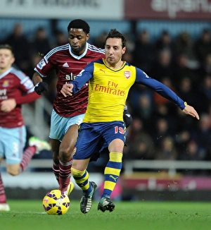West Ham United V Arsenal 2014-15 Prints: Clash of Midfield Maestros: Santi Cazorla vs
