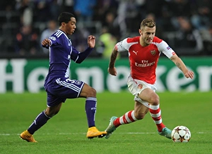 Anderlecht V Arsenal 2014-15 Prints: Clash of Midfield Maestros: Wilshere vs