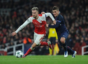 Arsenal V Paris Saint-Germain 2016-17 Prints: Clash of the Midfield Masters: Ramsey vs