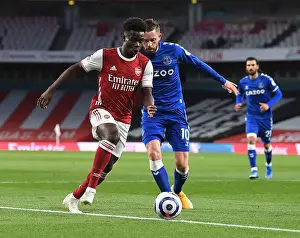 Clash of the Midfield: Saka vs. Sigurdsson - Empty Emirates Stadium Showdown