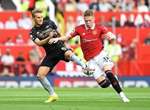 Clash of the Midfield Titans: Odegaard vs McTominay - A Premier League Showdown (Manchester United vs Arsenal, 2022-23)