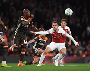 Arsenal V Brentford - Carabao Cup 2018-19 Prints: Clash of Midfield Titans: Aaron Ramsey vs
