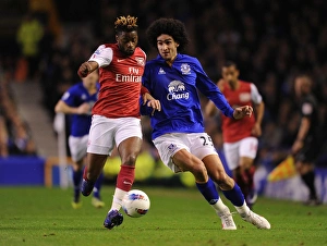 Everton V Arsenal 2011-12 Prints: Clash of Midfield Titans: Alex Song vs. Marouane Fellaini (Everton v Arsenal, 2012)
