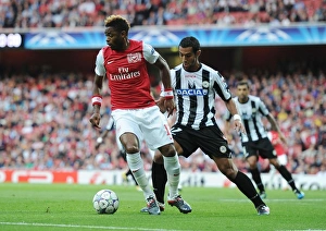Arsenal V Udinese 2011-12 Prints: Clash of Midfield Titans: Alex Song vs Medhi Benatia