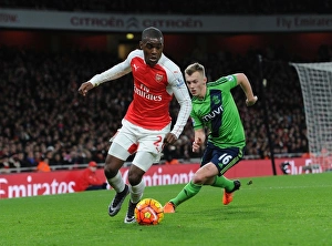 Arsenal V Southampton 2015-16 Prints: Clash of Midfield Titans: Campbell vs. Ward-Prowse in Arsenal vs. Southampton Showdown