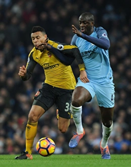 Manchester City V Arsenal 2016-17 Prints: Clash of the Midfield Titans: Coquelin vs. Yaya Toure, Premier League 2016-17